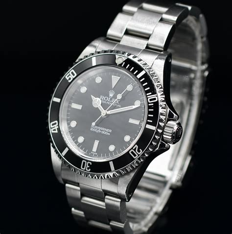 rolex submariner 14060 vs 11460|Rolex 14060 swiss only dial.